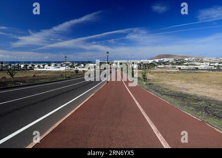 Long straight road and pavement, Playa Blanca, Lanzarote, Canary islands. Taken Feb 23 Stock Photo