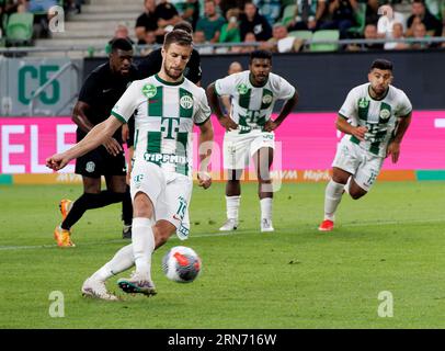 Budapest, Hungary. 31st August, 2023. Barnabas Varga of Ferencvarosi TC scores a penalty during the UEFA Europa Conference League Play Off Round Second Leg match between Ferencvarosi TC and FK Zalgiris Vilnius at Groupama Arena on August 31, 2023 in Budapest, Hungary. Credit: Laszlo Szirtesi/Alamy Live News Stock Photo
