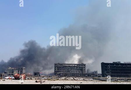 (150813) -- TIANJIN, Aug. 13, 2015 -- Buildings are damaged in the explosions in the Binhai New Area in north China s Tianjin Municipality, Aug. 13, 2015. The death toll has climbed to 44 from two massive blasts that ripped through a warehouse in north China s port city of Tianjin as of Thursday noon, according to rescue headquarters. Twelve firefighters were among the dead. ) (hgh) CHINA-TIANJIN-EXPLOSION (CN) LixJing PUBLICATIONxNOTxINxCHN   150813 Tianjin Aug 13 2015 Buildings are damaged in The Explosions in The Binhai New Area in North China S Tianjin Municipality Aug 13 2015 The Death to Stock Photo