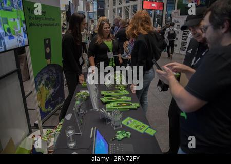 On August 31, 2023, Representatives at the YubiKey stand engaged with interested attendees, explaining the features and benefits of the YubiKey, a hardware authentication device designed to protect access to computers, networks, and online services. The device, used by tech giants like Google, Amazon, Microsoft, Twitter, and Facebook, supports one-time passwords (OTP), public-key cryptography, and authentication, as well as the Universal 2nd Factor (U2F) and FIDO2 protocols developed by the FIDO Alliance. (Photo by Michael Kuenne/PRESSCOV/Sipa USA) Stock Photo