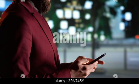 Entrepreneur strolling around town and admiring urban buildings near ...