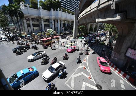 (150819) -- BANGKOK, Aug. 19, 2015 -- Traffic at the Ratchaprasong intersection resumes in Bangkok, capital of Thailand, on Aug. 19, 2015. A deadly explosion rocked Erawan Shrine, a popular tourist destination in downtown Bangkok, on Monday night, leaving at least 20 people dead and more than 100 others injured. ) THAILAND-BANGKOK-EXPLOSION-ERAWAN SHRINE-PRAYER LixMangmang PUBLICATIONxNOTxINxCHN   150819 Bangkok Aug 19 2015 Traffic AT The Ratchaprasong intersection resumes in Bangkok Capital of Thai country ON Aug 19 2015 a Deadly Explosion Rocked Erawan Shrine a Popular Tourist Destination in Stock Photo