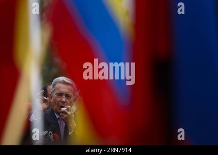 (150827) -- BOGOTA,   Former Colombian President and Senator Alvaro Uribe takes part in a sit-in in front of the Venzuelan consulate in Bogota, Colombia, on Aug. 26, 2015. According to local press, Uribe headed for Wednesday a sit-in in the Venezuelan consulate to demonstrate for the crisis generated by the closure of the border between Colombia and Venezuela and to protest against the treatment given to Colombians in the border. Mauricio Alvarado/) COLOMBIA-BOGOTA-VENEZUELA-SOCIETY-DEMONSTRATION COLPRENSA PUBLICATIONxNOTxINxCHN   150827 Bogota Former Colombian President and Senator Alvaro Uri Stock Photo
