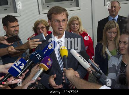 Slovenian Prime Minister Miro Cerar(C) speaks during a press conference at Refugee Center in Brezice, Slovenia, Sept. 19, 2015. Reports said more than 1000 refugees have entered Slovenia from Croatia so far. ) SLOVENIA-BREZICE-REFUGEE CRISIS-SLOVENIAN-PM MisoxLisanin PUBLICATIONxNOTxINxCHN   Slovenian Prime Ministers Miro Cerar C Speaks during a Press Conference AT Refugee Center in  Slovenia Sept 19 2015 Reports Said More than 1000 Refugees have entered Slovenia from Croatia as Far Slovenia  Refugee Crisis Slovenian PM MisoxLisanin PUBLICATIONxNOTxINxCHN Stock Photo