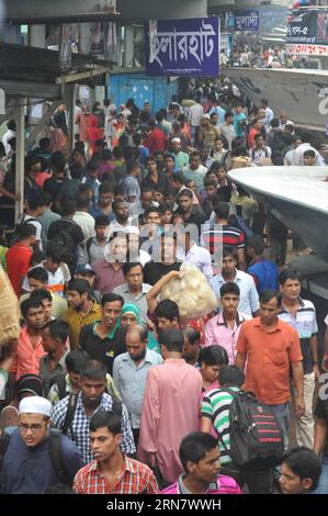 Bangladeshi passengers wait to go home for the upcoming Eid al-Adha festival, also called the feast of sacrifice, at a bus terminal in Dhaka, capital of Bangladesh, on Sept. 22, 2015. Millions of Dhaka dwellers have left the city for hometown to celebrate Eid al-Adha festival.)(zhf) BANGLADESH-DHAKA-EID AL-ADHA-TRAFFIC SharifulxIslam PUBLICATIONxNOTxINxCHN   Bangladeshi Passengers Wait to Go Home for The upcoming Oath Al Adha Festival Thus called The Feast of Sacrifice AT a Bus Terminal in Dhaka Capital of Bangladesh ON Sept 22 2015 Millions of Dhaka Dwellers have left The City for Home Town t Stock Photo