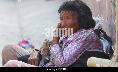 (151001) -- KATHMANDU, Oct. 1, 2015 -- An elderly beggar begs for alms on the International Day of Older Persons at Hanumandhoka Durbar Square in Kathmandu, Nepal, Oct. 1, 2015. The International Day of Older Persons is celebrated annually on Oct. 1. ) NEPAL-KATHMANDU-INTERNATIONAL DAY OF OLDER PERSONS SunilxSharma PUBLICATIONxNOTxINxCHN   Kathmandu OCT 1 2015 to Elderly Beggar Begs for Alms ON The International Day of Older Persons AT Hanumandhoka Durbar Square in Kathmandu Nepal OCT 1 2015 The International Day of Older Persons IS celebrated annually ON OCT 1 Nepal Kathmandu International Da Stock Photo