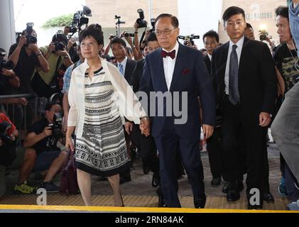 (151005) -- HONG KONG, Oct. 5, 2015 -- Donald Tsang Yam-kuen (2nd L, front), former chief executive of the Hong Kong Special Administrative Region (HKSAR), arrives at Eastern Magistracy in Hong Kong, south China, Oct. 5, 2015, to face two counts of misconduct in public office. Tsang was released on cash bail of 100,000 HK dollars (12,903 U. S. dollars) and will appear at Eastern Magistracy again on November 13. ) (ry) CHINA-HONG KONG-FORMER CHIEF EXECUTIVE-COURT (CN) NgxWingxKin PUBLICATIONxNOTxINxCHN   Hong Kong OCT 5 2015 Donald Tsang Yam Kuen 2nd l Front Former Chief Executive of The Hong K Stock Photo