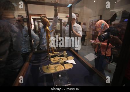 (151011) -- CAIRO, Oct. 11, 2015 -- Visitors look at exhibits on an exhibition about footwears in ancient Egypt at the Egyptian Museum in Cairo, Egypt, on Oct. 11, 2015. An exhibition called Stepping Through Time held by Egypt s Ministry of Antiquities was open to the public on Sunday, presenting around 50 objects through different ages. ) EGYPT-CAIRO-CULTURE-FOOTWEAR-EXHIBITION AhmedxGomaa PUBLICATIONxNOTxINxCHN   151011 Cairo OCT 11 2015 Visitors Look AT Exhibits ON to Exhibition About  in Ancient Egypt AT The Egyptian Museum in Cairo Egypt ON OCT 11 2015 to Exhibition called stepping Throug Stock Photo