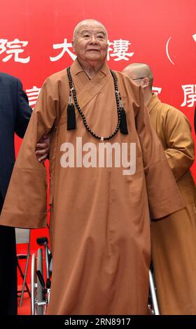 (151012) -- NANJING, Oct. 12, 2015 -- Master Hsing Yun, founder of the influential Fo Guang Shan Monastery in southeast China s Taiwan, attends the launching ceremony of an academy built for Chinese art research in a campus of Nanjing University in Nanjing, capital of east China s Jiangsu Province, Oct. 12, 2015. The academy building is named after Hsing Yun for his devotion in 2010 to the project. Located inside the building, the Li Chimao Art Museum was officially opened on Monday. ) (yxb) CHINA-NANJING-NEW COLLEGE BUILDING (CN) SunxCan PUBLICATIONxNOTxINxCHN   151012 Nanjing OCT 12 2015 Mas Stock Photo