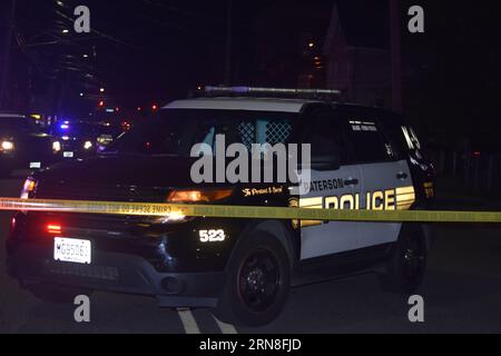 Paterson, United States. 30th Aug, 2023. Crime scene tape and Paterson police vehicles block the area surrounding the crime scene. Two people were shot in Paterson. The two victims were brought to the hospital, Wednesday evening after being shot around 8:49 PM. Multiple police vehicles and officers were present at the scene, investigating the shooting. (Photo by Kyle Mazza/SOPA Images/Sipa USA) Credit: Sipa USA/Alamy Live News Stock Photo