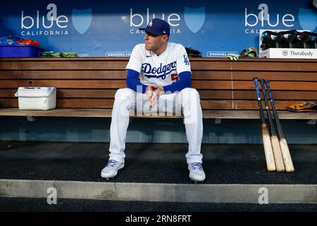 Los Angeles Dodgers first baseman Freddie Freeman (5) sits in the dugout prior to a regular season game between the Arizona Diamondbacks and Los Angel Stock Photo