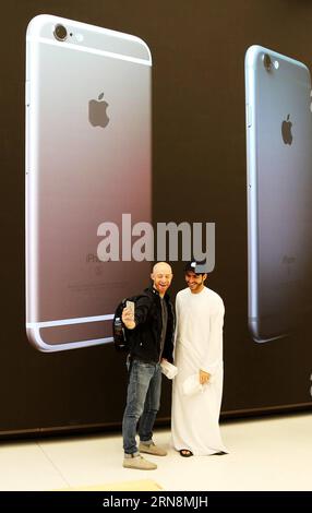 (151029) -- DUBAI, Oct. 29, 2015 -- Customers take a selfie in an Apple Store during its opening day at a shopping mall in Dubai, United Arab Emirates, Oct. 29, 2015. Apple has opened its first retail stores in the Middle East with two shops in the United Arab Emirates. The two new stores for the Cupertino, California-based technology giant are in Dubai s Mall of the Emirates and Abu Dhabi s Yas Mall. ) UAE-DUBAI-TECHNOLOGY-APPLE LixZhen PUBLICATIONxNOTxINxCHN   Dubai OCT 29 2015 customers Take a Selfie in to Apple Store during its Opening Day AT a Shopping Mall in Dubai United Arab Emirates O Stock Photo