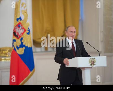 Russian President Vladimir Putin addresses the awarding ceremony in Moscow Nov. 4, 2015. Putin on Wednesday presented national medals to foreign citizens, including Chinese translator Liu Weifei, for their particular contribution to the strengthening of peace, friendship, cooperation and understanding between nations. ) RUSSIA-MOSCOW-NATIONAL MEDAL-AWARDING DaixTianfang PUBLICATIONxNOTxINxCHN   Russian President Vladimir Putin addresses The awarding Ceremony in Moscow Nov 4 2015 Putin ON Wednesday presented National Medals to Foreign Citizens including Chinese translator Liu Weifei for their P Stock Photo