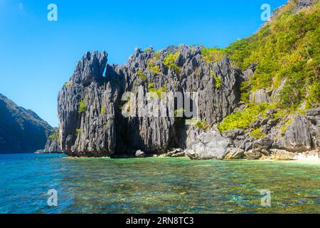 Beach landscape in Palawan island, Philippines. Seven Commando Beach. Horizontal image with copy space for text Stock Photo