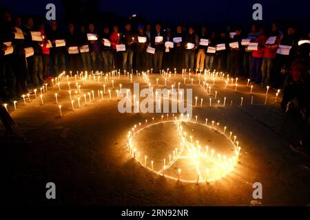 (151115) -- KATHMANDU, Nov. 15, 2015 -- Nepalese people form the shape of the Eiffel Tower with candles during a candlelight vigil in memory of the victims killed in the Friday s attacks in Paris, in Kathmandu, Nepal, Nov. 15, 2015. ) (djj) NEPAL-KATHMANDU-PARIS-ATTACK-CANDLELIGHT VIGIL PratapxThapa PUBLICATIONxNOTxINxCHN   Kathmandu Nov 15 2015 Nepalese Celebrities Shape The Shape of The Eiffel Tower With Candles during a Candle Light Vigil in Memory of The Victims KILLED in The Friday S Attacks in Paris in Kathmandu Nepal Nov 15 2015 djj Nepal Kathmandu Paris Attack Candle Light Vigil Pratap Stock Photo