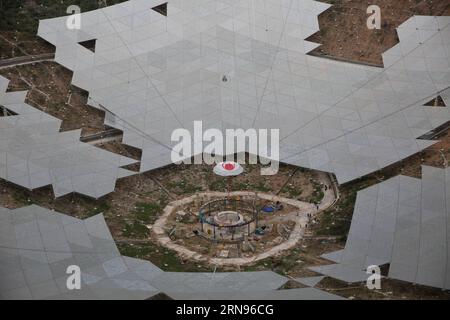 Bau des weltgrößten Radioteleskops in China (151121) -- PINGTANG, Nov. 21, 2015 -- The feed cabin supporting system of China s single-aperture spherical telescope FAST is under test in Qiannan of southwest China s Guizhou Province, Nov. 21, 2015. When it is completed in 2016, the five hundred meter aperture spherical telescope (FAST) will be the world s largest, overtaking Puerto Rico s Arecibo Observatory, which is 300 meters in diameter. ) (zhs) CHINA-GUIZHOU-FAST-TELESCOPE (CN) JinxLiwang PUBLICATIONxNOTxINxCHN   Construction the world Radio telescope in China 151121 Ping Tang Nov 21 2015 T Stock Photo