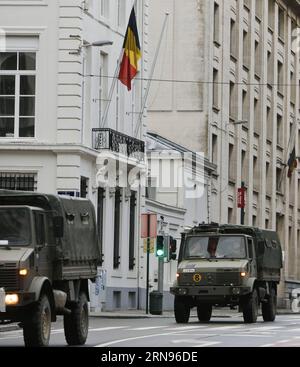 Terrorwarnung in Brüssel: Sicherheitskräfte auf den Straßen (151121)-- BRUSSELS, Nov. 21, 2015 -- Military vehicles are seen running through Brussels, capital of Belgium, on Nov. 21, 2015. The terror threat level in the Brussels region was increased to maximum on Saturday because authorities received information on the risk of an attack similar to Paris, Belgian Prime Minister Charles Michel told a press conference. ) BELGIUM-BRUSSELS-TERRORIST THREAT ALERT-HIGHEST ZhouxLei PUBLICATIONxNOTxINxCHN   Terror warning in Brussels Security forces on the Roads 151121 Brussels Nov 21 2015 Military VEH Stock Photo