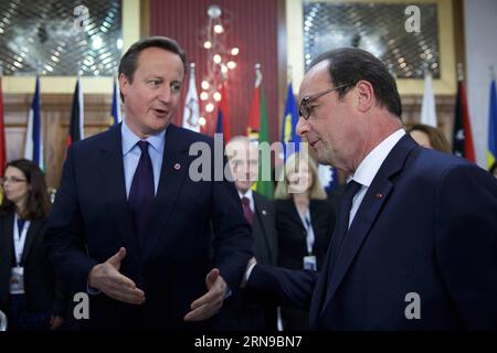 (151127) -- MELLIEHA (MALTA), Nov. 27, 2015 -- British Prime Minister David Cameron (L) talks with French President Francois Hollande before the Climate Action Special Executive Session at the Commonwealth Heads of Government Meeting (CHOGM) in Valletta, Malta, on Nov. 27, 2015. ) MALTA-MELLIEHA-CHOGM-CLIMATE-SPECIAL EXECUTIVE SESSION JinxYu PUBLICATIONxNOTxINxCHN   151127 Mellieha Malta Nov 27 2015 British Prime Ministers David Cameron l Talks With French President François Hollande Before The CLIMATE Action Special Executive Session AT The Commonwealth Heads of Government Meeting CHOGM in Va Stock Photo