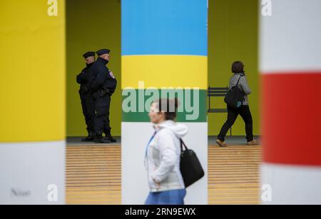 (151202) -- PARIS, Dec. 2, 2015 -- Police officers patrol the site of the 2015 United Nations Climate Change Conference (COP 21) at Le Bourget on the northern suburbs of Paris, France, Dec. 2, 2015. The Paris climate talks entered stage of substantive negotiations on Tuesday as negotiators began to turn political will that their leaders expressed into concrete solutions to various disputes over a new climate agreement. Officials from 195 countries have one final week to slim the agreement draft which now runs over 50 pages to a manageable level so that their ministers could read when they join Stock Photo