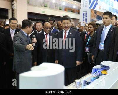 (151204) -- JOHANNESBURG, Dec. 4, 2015 -- Chinese President Xi Jinping (3rd L, front) and South African President Jacob Zuma (2nd L, front) visit China-Africa equipment manufacturing industry exhibition in Johannesburg, South Africa, Dec. 4, 2015. Xi, Zuma and Zimbabwean President Robert Mugabe attended the opening ceremony of the exhibition here on Friday. )(mcg) SOUTH AFRICA-JOHANNESBURG-CHINA-XI JINPING-EQUIPMENT MANUFACTURING INDUSTRY EXHIBITION MaxZhancheng PUBLICATIONxNOTxINxCHN   151204 Johannesburg DEC 4 2015 Chinese President Xi Jinping 3rd l Front and South African President Jacob Zu Stock Photo