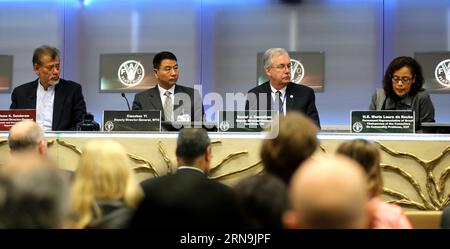 (151209) -- ROME, Dec. 9, 2015 -- (from 1st to 3rd, L) Jomo Kwame Sundaram, FAO assistant director-general and coordinator for Economic and Social Development, Yi Xiaozhun, WTO deputy director-general, and Daniel Gustafson, FAO deputy director-general, listen on during a press conference for the release of the State of Agricultural Commodity Markets (SOCO) 2015-2016 in Rome, Italy, on Dec. 9, 2015. The Rome-based United Nations Food and Agriculture Organization (FAO) published The State of Agricultural Commodity Markets (SOCO) 2015-2016 on Wednesday, calling for a pragmatic approach that would Stock Photo