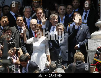(151210) -- BUENOS AIRES, Dec. 10, 2015 -- Argentina s new President Mauricio Macri (R Front) waves to supporters with his wife Julliana Awada (L Front) from the stairway of the National Congress after taking oath in Buenos Aires, capital of Argentina, on Dec. 10, 2015. Mauricio Macri on Thursday inaugurated as new Argentine President, succeeding Cristina Fernandez. Agustin Marcarian) (fnc) (ah) ARGENTINA-BUENOS AIRES-POLITICS-INAUGURATION e AgustinxMarcarian PUBLICATIONxNOTxINxCHN   151210 Buenos Aires DEC 10 2015 Argentina S New President Mauricio Macri r Front Waves to Supporters With His w Stock Photo