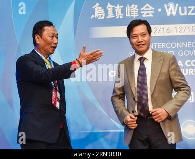 (151216) -- TONGXIANG, Dec. 16, 2015 -- Terry Gou (L), founder and CEO of Foxconn Technology Group, talks with Lei Jun, founder of Xiaomi Technology, during the Cross-Straits and Hong Kong, Macao Internet Development Forum of 2015 World Internet Conference in Wuzhen, east China s Zhejiang Province, Dec. 16, 2015. )(mcg) CHINA-ZHEJIANG-WUZHEN-WIC-SUB FORUM (CN) XuxYu PUBLICATIONxNOTxINxCHN   151216 Tong Xiang DEC 16 2015 Terry Gou l Founder and CEO of Foxconn Technology Group Talks With Lei jun Founder of Xiaomi Technology during The Cross Straits and Hong Kong Macao Internet Development Forum Stock Photo