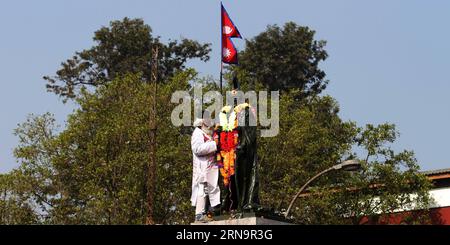 (151216) -- KATHMANDU, Dec. 16, 2015 -- A man puts garlands on a statue of late King Mahendra on his anniversary near the Royal Palace in Kathmandu, capital of Nepal, on Dec. 16, 2015. Nepalese people supporting monarchy gathered to pay homage to late King Mahendra on his anniversary. ) NEPAL-KATHMANDU-LATE KING MAHENDRA-ANNIVERSARY SunilxSharma PUBLICATIONxNOTxINxCHN   151216 Kathmandu DEC 16 2015 a Man Puts Garlands ON a Statue of Late King Mahendra ON His Anniversary Near The Royal Palace in Kathmandu Capital of Nepal ON DEC 16 2015 Nepalese Celebrities Supporting Monarchy gathered to Pay H Stock Photo