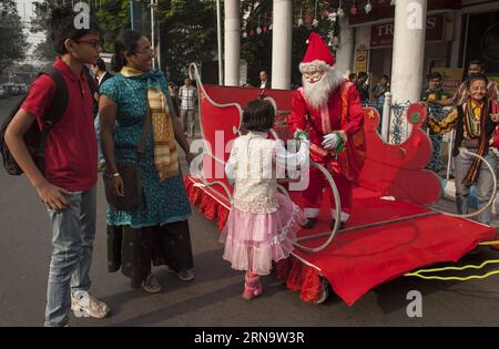 (151220) -- KOLKATA, Dec. 20, 2015 -- Indian children take part in a Christmas procession for upcoming Christmas in Kolkata, capital of eastern Indian state of West Bengal, Dec. 20, 2015. ) INDIA-KOLKATA-CHRISTMAS PROCESSION TumpaxMondal PUBLICATIONxNOTxINxCHN   151220 Kolkata DEC 20 2015 Indian Children Take Part in a Christmas Procession for upcoming Christmas in Kolkata Capital of Eastern Indian State of WEST Bengal DEC 20 2015 India Kolkata Christmas Procession TumpaxMondal PUBLICATIONxNOTxINxCHN Stock Photo