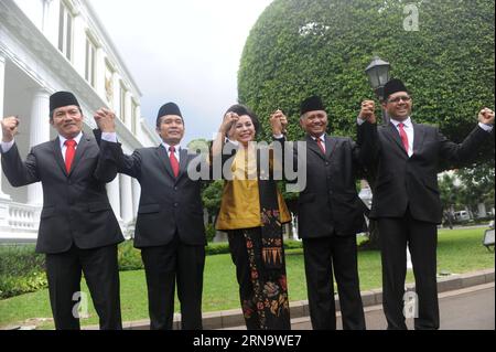 (151221) -- JAKARTA, Dec. 21, 2015 -- Indonesia s Corruption Eradication Commision (KPK) new leaders Saut Situmorang, Alexander Marwata, Basaria Panjaitan, Agus Raharjo and Laode Muhammad Syarif (from L to R) pose for a group photo before an inauguration at the Presidential Palace in Jakarta, Indonesia, Dec. 21, 2015. Indonesia s House Commission III on Thursday voted for a new KPK leadership for a greater focus on corruption prevention. ) INDONESIA-JAKARTA-KPK-NEW LEADERSHIP-INAUGURATION AgungxKuncahyaxB. PUBLICATIONxNOTxINxCHN   151221 Jakarta DEC 21 2015 Indonesia S Corruption Eradication C Stock Photo