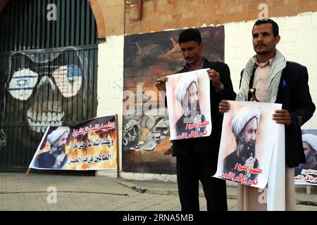 (160107) -- SANAA, Jan. 7, 2016 -- Protesters holding pictures of the Shiite cleric Nmer al Nmir stand outside the Saudi embassy in Sanaa, Yemen, on Jan. 7, 2016. Some Yemenis held a rally Wednesday against the Saudi execution of prominent Shiite cleric Nmer al Nmir outside the Saudi embassy in Sanaa. ) YEMEN-SANAA-SAUDI ARABIA-EMBASSY-PROTEST HanixAli PUBLICATIONxNOTxINxCHN   160107 Sanaa Jan 7 2016 protesters Holding Pictures of The Shiite cleric  Al  stand outside The Saudi Embassy in Sanaa Yemen ON Jan 7 2016 Some Yemenis Hero a Rally Wednesday against The Saudi Execution of Prominent Shii Stock Photo