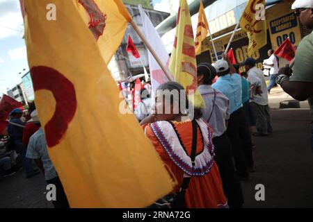 (160110) -- PANAMA CITY, Jan. 9, 2016 -- Members of different social movements take part in a march held in commemoration of the Martyrs Day, in Panama City, capital of Panama, on Jan. 9, 2016. The Martyrs Day was a movement occurred in Panama on Jan. 9, 1964, when troops of the U.S. Army clashed with high school students who demanded the right to raise the national flag in the area known as Canal Zone, a strip of land around the Panama Canal, which was ceded to the United States of America in perpetuity as a result of the Hay-Bunau-Varilla Treaty. ) PANAMA-PANAMA CITY-MARTYRS DAY-COMMEMORATIO Stock Photo