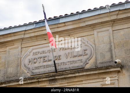 Saint emilion , France -  08 28 2023 : city hall facade french flag with text hotel de ville on town hall entrance in town France Stock Photo
