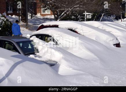 (160125) -- WASHINGTON D.C., Jan. 25, 2016 -- A man walks by vehicles buried in snow in Arlington, Virgina, the United States, Jan. 25, 2016. Residents began to shovel their way out of snow after the near-record snowfall that blanketed the U.S. East Coast. ) U.S.-WASHINGTON D.C.-SNOW STORM-AFTERMATH YinxBogu PUBLICATIONxNOTxINxCHN   160125 Washington D C Jan 25 2016 a Man Walks by VEHICLES Buried in Snow in Arlington Virginia The United States Jan 25 2016 Residents began to shovel their Way out of Snow After The Near Record snowfall Thatcher blanketed The U S East Coast U S Washington D C Snow Stock Photo