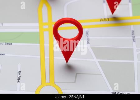 Close-up Of A Road Map With Red Navigation Icons Stock Photo