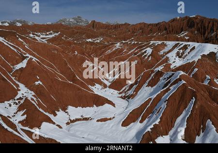 (160203) -- TURPAN, Feb. 2, 2016 -- Photo taken on Feb. 2, 2016 shows the Huoyan (Flaming) Mountain covered with snow in Turpan, northwest China s Xinjiang Uygur Autonomous Region. ) (wyo) CHINA-XINJIANG-HUOYAN MOUNTAIN-SNOW VIEW (CN) LiuxJian PUBLICATIONxNOTxINxCHN   Turpan Feb 2 2016 Photo Taken ON Feb 2 2016 Shows The  Flaming Mountain Covered With Snow in Turpan Northwest China S Xinjiang Uygur Autonomous Region wyo China Xinjiang  Mountain Snow View CN  PUBLICATIONxNOTxINxCHN Stock Photo