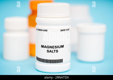 Magnesium salts refer to a group of medications used to treat low levels of magnesium in the body. They are available in various forms, such as tablet Stock Photo