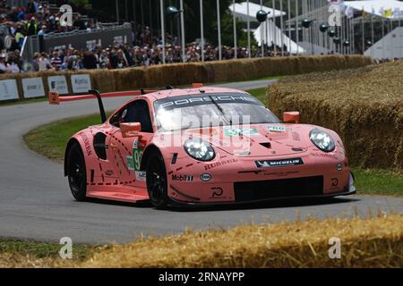 Porsche 911 RSR, Pink Pig livery tribute, 75 Years of Porsche, Le Mans Winners, with 19 out right victories along with numerous class wins, at the fam Stock Photo