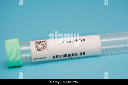 Salivary Ph Test This test measures the acidity or alkalinity of the saliva. It is used to assess oral health and monitor certain medical conditions, Stock Photo