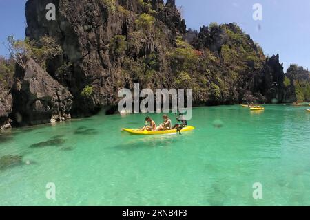(160218) -- PALAWAN PROVINCE, Feb. 18, 2016 -- Vacationers take kayaks to tour around limestone formations in Palawan Province, the Philippines, Feb. 18, 2016. Tourism revenues are expected to reach 6.5 billion U.S. dollars from the arrivals of six million foreign visitors in 2016 according to the Philippine Department of Tourism. ) PHILIPPINES-PALAWAN PROVINCE-TOURISM RouellexUmali PUBLICATIONxNOTxINxCHN   Palawan Province Feb 18 2016 vacationers Take Kayaks to Tour Around limestone formations in Palawan Province The Philippines Feb 18 2016 Tourism revenues are expected to Reach 6 5 Billion U Stock Photo