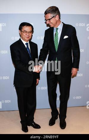 BERLIN, Feb. 25, 2016 -- Chinese Commerce Minister Gao Hucheng (L) meets with Federation of German Industries (BDI) President Ulrich Grillo in Berlin, capital of Germany, on Feb. 25, 2016. Chinese Commerce Minister Gao Hucheng said on Thursday that economic and trade cooperation between China and Germany was in good momentum in recent years, both sides should make joint efforts to gain more achievements. ) GERMANY-BERLIN-CHINA-GAO HUCHENG-ULRICH GRILLO-MEETING ZhangxFan PUBLICATIONxNOTxINxCHN   Berlin Feb 25 2016 Chinese Commerce Ministers Gao Hucheng l Meets With Federation of German Industri Stock Photo