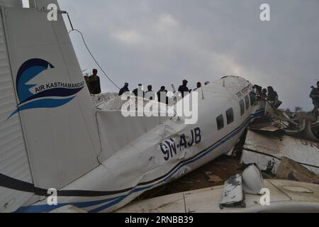 (160227) -- KALIKOT, Feb. 26, 2016 -- People gather around the crash-landing site of 9N-AJB plane of Air Kasthamandap in Kalikot district in far western Nepal, Feb. 26, 2016. Two pilots were killed when the 9N-AJB plane of Air Kasthamandap, carrying nine passengers and two crew members on board, crash landed in the remote district of Kalikot while enroute to Jumla district from Nepalgunj, after failing to land at Jumla airport due to some technical glitches. )(dh) NEPAL-KALIKOT-PLANE-CRASH LANDING-SITE SorajxShahi PUBLICATIONxNOTxINxCHN   Feb 26 2016 Celebrities gather Around The Crash Landing Stock Photo