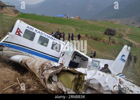 (160227) -- KALIKOT, Feb. 26, 2016 -- Photo taken on Feb. 26, 2016 shows the crash-landing site of 9N-AJB plane of Air Kasthamandap in Kalikot district in far western Nepal. Two pilots were killed when the 9N-AJB plane of Air Kasthamandap, carrying nine passengers and two crew members on board, crash landed in the remote district of Kalikot while enroute to Jumla district from Nepalgunj, after failing to land at Jumla airport due to some technical glitches. )(dh) NEPAL-KALIKOT-PLANE-CRASH LANDING-SITE SorajxShahi PUBLICATIONxNOTxINxCHN   Feb 26 2016 Photo Taken ON Feb 26 2016 Shows The Crash L Stock Photo