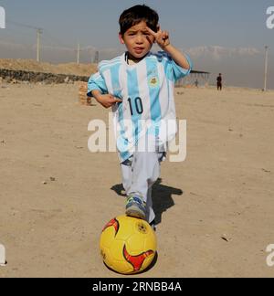 KABUL, Feb. 26, 2015 -- Afghan boy Murtaza Ahmadi poses for photos wearing a new jersey signed by Argentina soccer star Lionel Messi in Kabul, capital of Afghanistan, Feb. 26, 2016. Five-year-old Murtaza Ahmadi who became a social media hit after wearing a plastic bag bearing Lionel Messi s number 10 finally received the real thing which was sent by the Argentine footballer himself. ) AFGHANISTAN-KABUL-AFGHAN BOY RECEIVED MESSI S JERSEY RahmatxAlizadah PUBLICATIONxNOTxINxCHN   Kabul Feb 26 2015 Afghan Boy Murtaza Ahmadi Poses for Photos Wearing a New Jersey signed by Argentina Soccer Star Lion Stock Photo