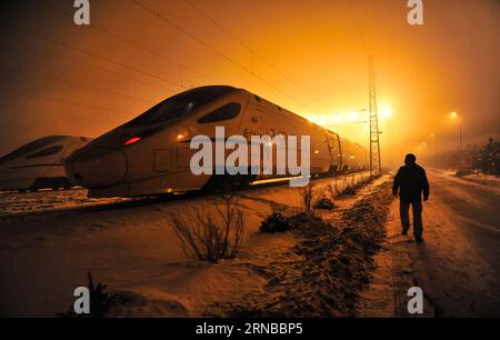 File photo taken on Feb. 9, 2013 shows a bullet train arriving for maintenance in Changchun, capital of northeast China s Jilin Province. Building more high-speed railways has been a hot topic at the annual sessions of China s provincial legislatures and political advisory bodies intensively held in January. China has the world s largest high-speed rail network, with the total operating length reaching 19,000 km by the end of 2015, about 60 percent of the world s total. The expanding high-speed rail network is offering unprecedented convenience and comfort to travelers, and boosting local deve Stock Photo