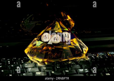 AI, artificial intelligence the new diamond of information technology, colorful image with closeup of laptop and diamond Stock Photo