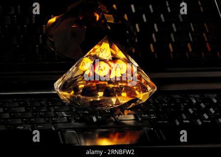 AI, artificial intelligence the new diamond of information technology, colorful image with closeup of laptop and diamond Stock Photo