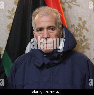 (160306) -- TRIPOLI, March 6, 2016 -- The Italian hostage named Filippo Calcagno is seen in Tripoli, Libya, March 6, 2016. Two Italian nationals kidnapped last July in Libya have been freed, the Italian foreign ministry said in a statement on Friday. Gino Pollicardo, 55, and Filippo Calcagno, 65, were kidnapped in the western port of Mellitah, near the industrial complex owned by Italy s energy giant ENI together with two Italian colleagues. All four were technicians working for the Bonatti construction company. Meanwhile, the two other Italian hostages, Salvatore Failla and Fausto Piano, died Stock Photo