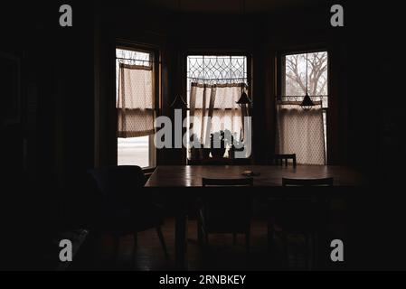 Serene view of a dining room in morning light during winter Stock Photo