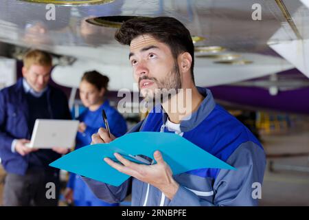 engine of the airplane under heavy maintenance Stock Photo